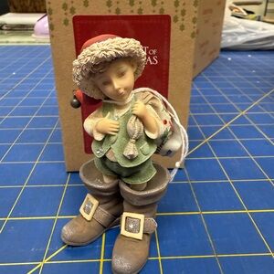 Festive Holiday Figurine with Red Hat and Green Outfit